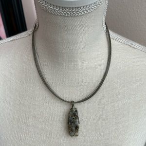 Multi strand, silver tone, natural stone wire wrapped necklace.